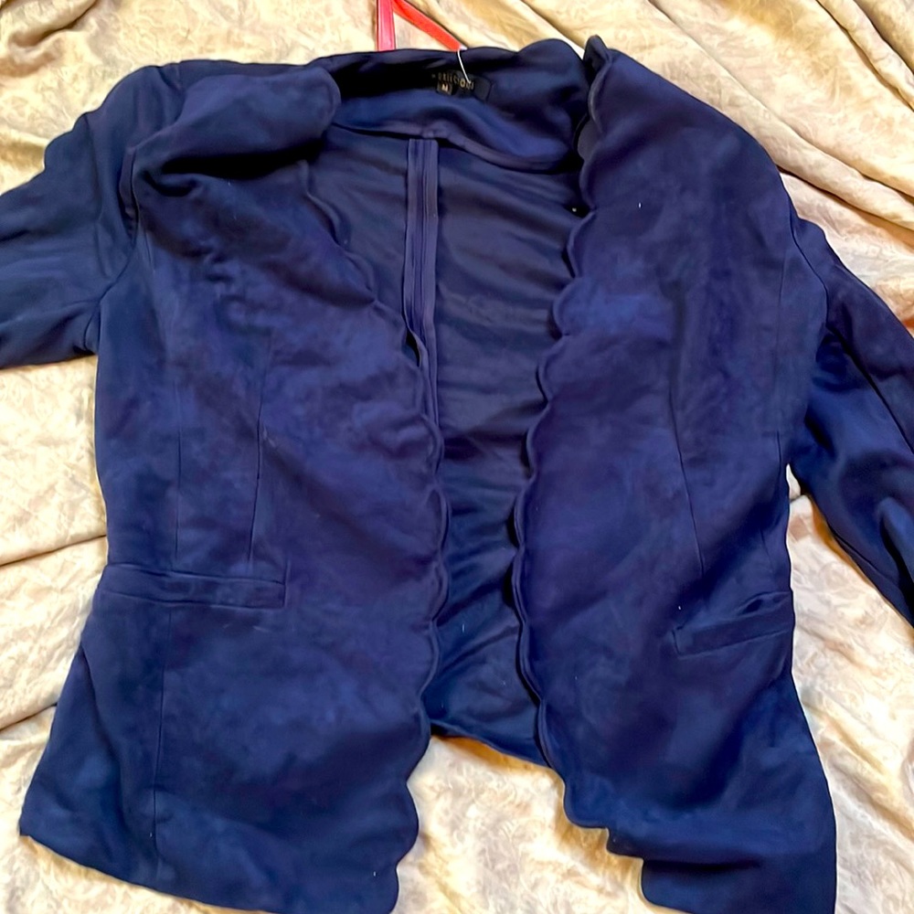 100 percent polyester feels like suede but it is light weight
